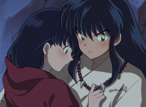 human inuyasha protecting kagome in his arms in their embrace