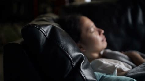 asian woman sick alone sleeping at sofa with stock footage sbv