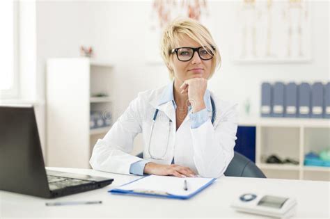 Smiling Doctor At Her Office Stock Image Image Of Occupation