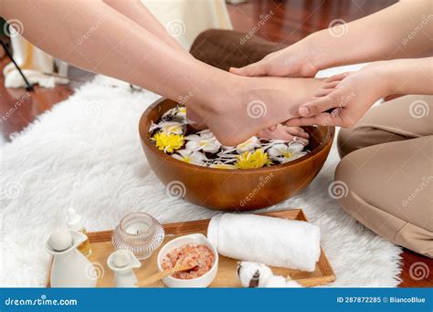 woman indulges  blissful foot massage  luxurious spa salon