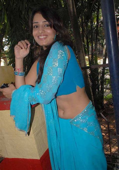 south indian actress nikitha blue saree hot navel photos gallery latest stills
