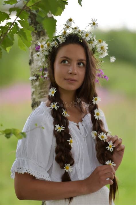Sweet Russian Girl Girl In A White Birch In The Summer With A Wreath
