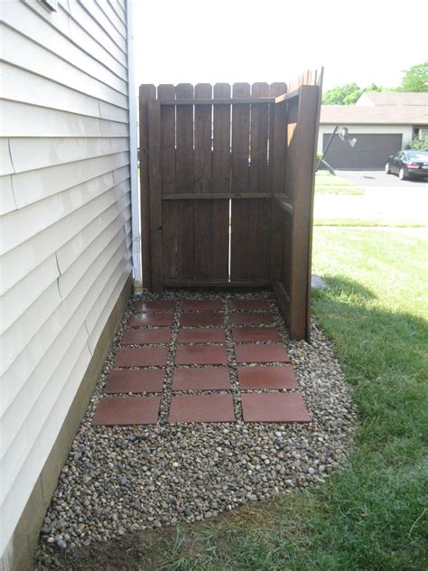 trash  area transformed  pavers  rock