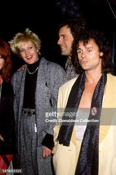 American Actress Melanie Griffith Poses For A Portrait With Friends