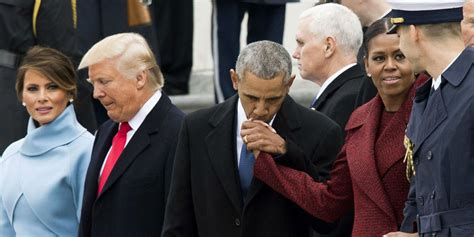 watch barack and michelle obama s sweet hand kiss at donald trump s