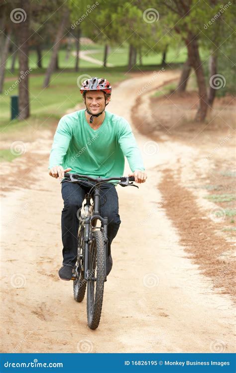 man riding bicycle  park stock image image  full