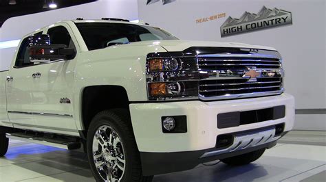 chevy silverado hd high country debuts   denver auto show  fast lane truck