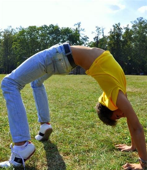 Hot Young Guy Doing A Back Bend In A Crop Top