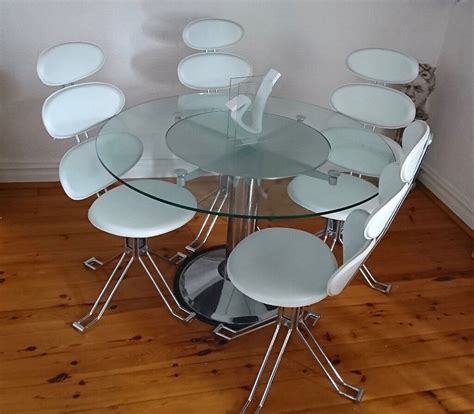 revolving modern contemporary  glass dining table  white