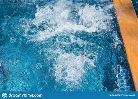 massage  spa swimming pool  bubbles blue water stock image