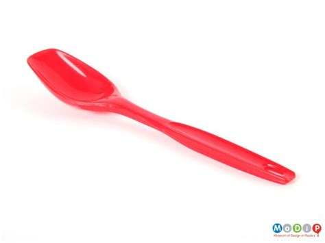 large red serving spoon museum  design  plastics
