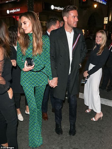 armie hammer and elizabeth chambers go hand in hand to afi