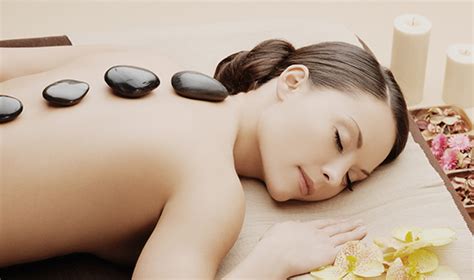 melt the stress away with hot stone massage mahima