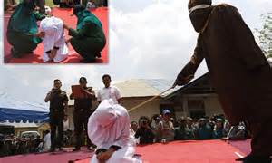Indonesian Woman Is Whipped In Front Of A Crowd Because