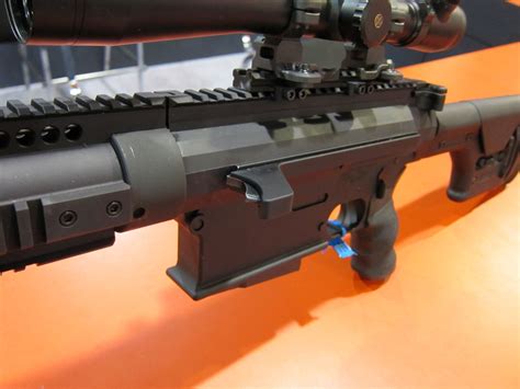 bushmaster  lapua magnum mcr multi caliber rifle semi auto