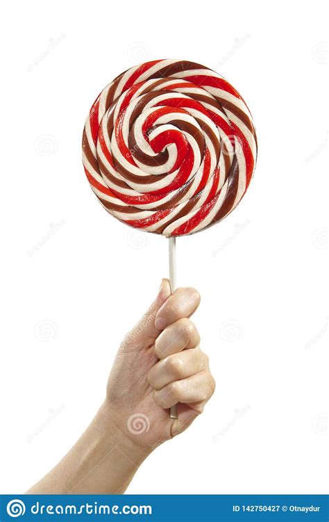 hand holding large lollipop stock image image  candy isolated