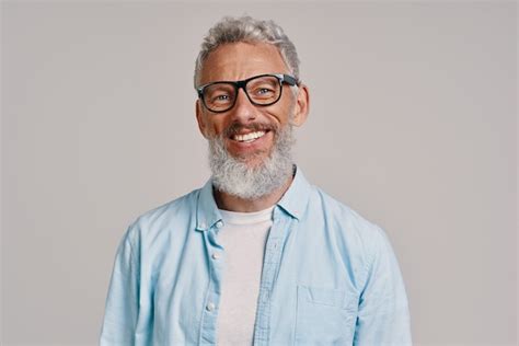 Premium Photo Handsome Senior Man In Eyeglasses Looking At Camera And