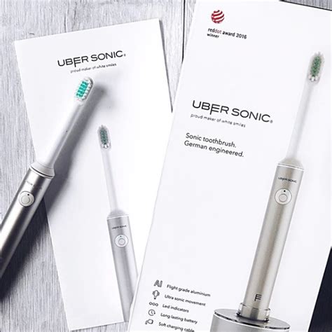 uber sonic club electric toothbrush flatlay chadwick package design uber sonic lashes