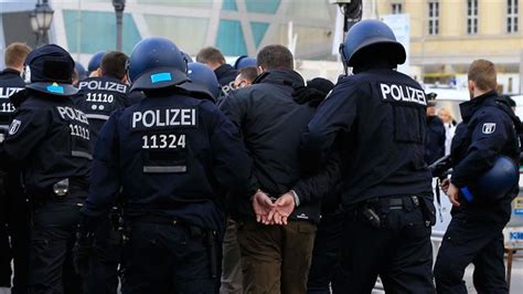 german police raids target neo nazi group combat 18