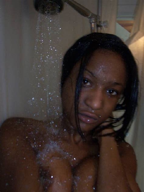 dark skinned amateur teen with small firm tits and bald pussy takes a shower