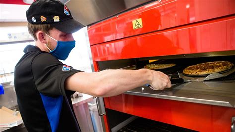 dominos  hire    workers