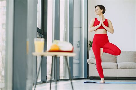 slim woman  yoga exercise  living room  stock photo