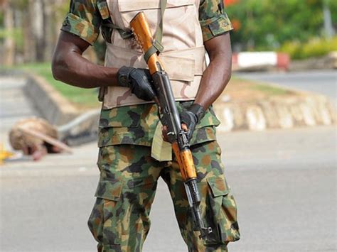 army colonel killed in benue angry soldiers burn houses in revenge