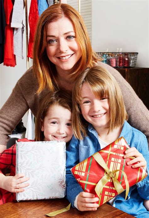 alyson hannigan and her adorable daughters give back for christmas us weekly