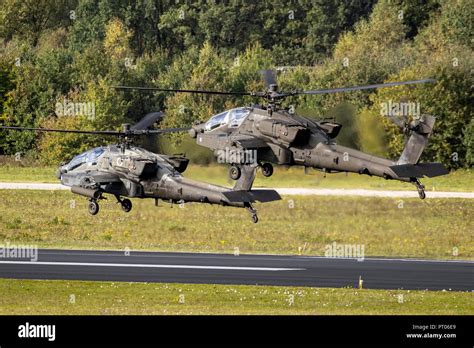 eindhoven  netherlands oct     army boeing ah  apache attack helicopters