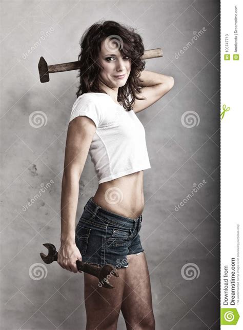 girl holding hammer and wrench spanner stock image image