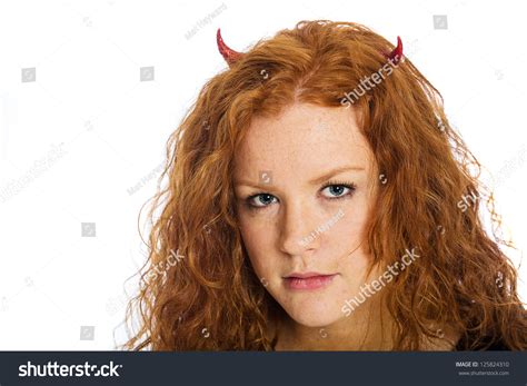 A Woman With Beautiful Natural Red Hair And Scary Devil