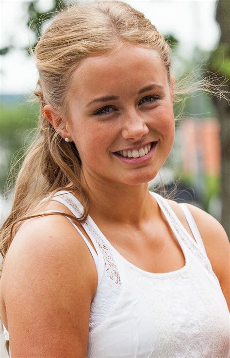 photo of a blond beautiful girl photographed in sigtuna sweden in june