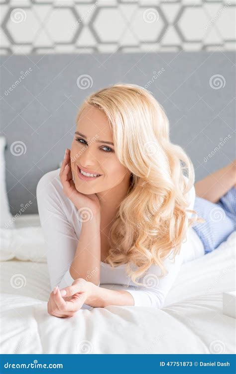 Pretty Blond Woman Lying In Prone On Bed Stock Image Image Of Lovely