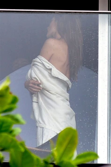 alessandra ambrosio in a sexy bikini on the hotel balcony