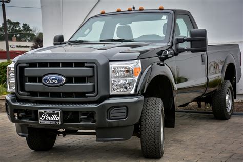 pre owned  ford super duty   srw xl regular cab pickup