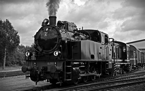 black train  rail  showing smoke  stock photo