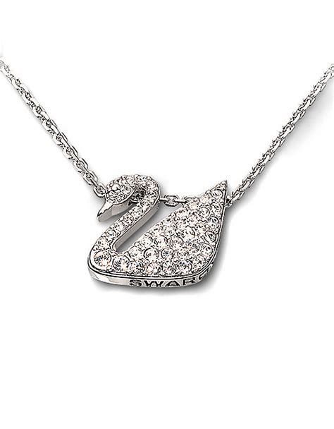 lyst swarovski crystal swan pendant necklace  metallic
