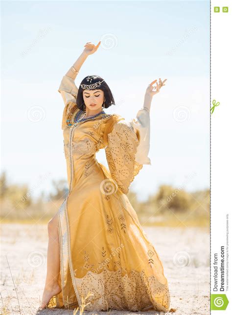 Beautiful Woman Like Egyptian Queen Cleopatra On In Desert