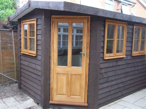 odd shaped custom shed custom sheds crooked house pallet shed