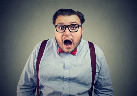 Chubby Man In Short And Glasses With Shocked Face Expression Stock