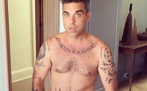 He S At It Again Robbie Williams Strips Naked For His New