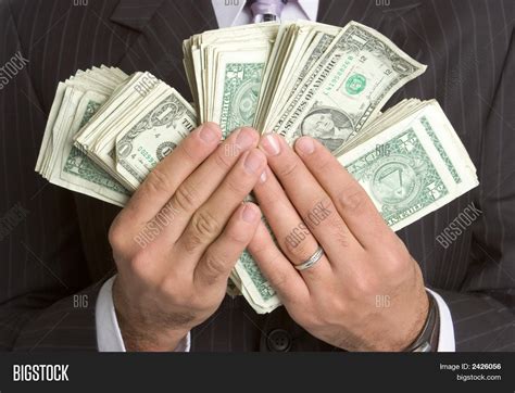 hands holding money image photo  trial bigstock