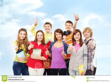 A Group Of Happy Teenagers Posing Together Stock Image