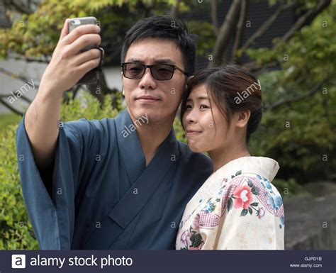 Japanese Couple Dressed In Traditional Yukata Dress Take Selfie Tokyo