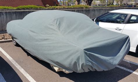 car guy  takes  car   mall  puts  car covers