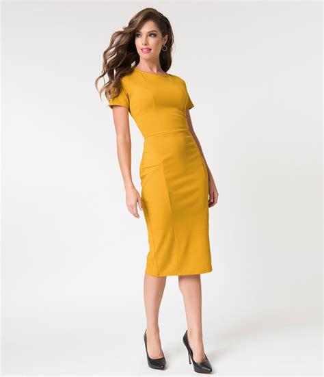 1960s mustard yellow short sleeve stretch mod wiggle dress yellow
