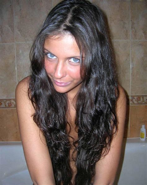 amateur brunette shows off her body in the shower hot photos gallery