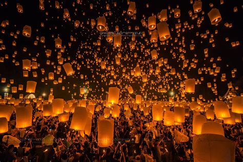 lanterns lighted  sky  celebrate   merit  yi peng