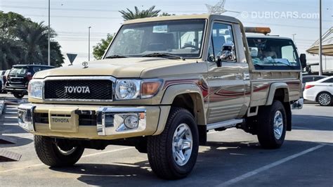 toyota land cruiser pickup lx   wd  local top options  sale aed  beige