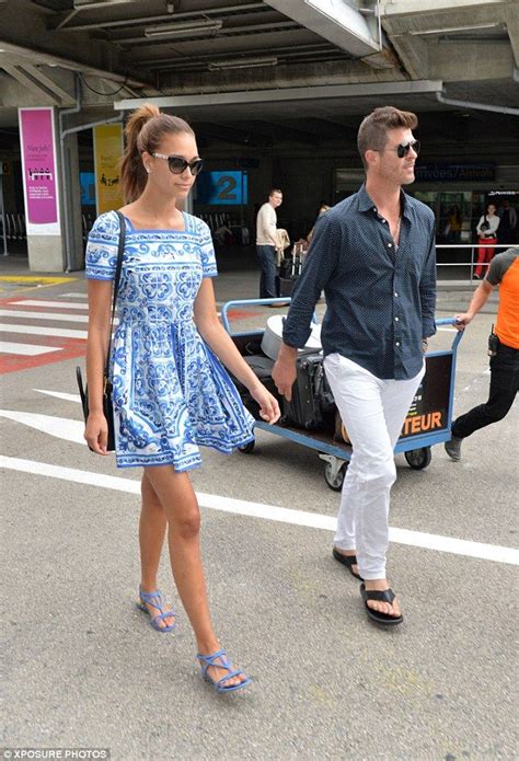 robin thicke and girlfriend april love geary touch down in